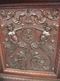 109 - 1911 Sideboard by Oriel Cabinet Co. that features massively carved mascarons, Norman soldiers, atlantes and caryatid figures as well as griffins in full relief (part of the "Norman Suite"), 99in. tall, 82in. wide, 28in. deep (door panel)