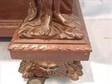 111 - 1911 Server by Oriel Cabinet Co. that features massively carved mascarons, Norman soldiers, atlantes and caryatid figures as well as griffins in full relief (part of the "Norman Suite"), 66in. tall, 54in. wide, 24in. deep (atlantes figure, 2)