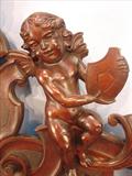 111 - 1911 Server by Oriel Cabinet Co. that features massively carved mascarons, Norman soldiers, atlantes and caryatid figures as well as griffins in full relief (part of the "Norman Suite"), 66in. tall, 54in. wide, 24in. deep (atlantes figure)