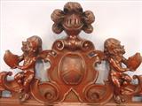 111 - 1911 Server by Oriel Cabinet Co. that features massively carved mascarons, Norman soldiers, atlantes and caryatid figures as well as griffins in full relief (part of the "Norman Suite"), 66in. tall, 54in. wide, 24in. deep (crown)
