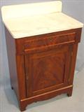 103 - Flamed Mahogany, Empire, Marble top Wash Stand with back-splash, 30in. tall, 22in. wide, 15in. deep