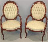 205 - Pair of Mahogany, Victorian, Parlor Arm Chairs with rose-carved crowns
