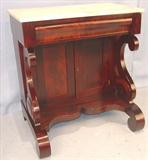 141 - Flamed Mahogany, Empire, Marble top Wash Stand with scroll feet