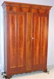122 - Flamed Mahogany, Empire, Knock-down Wardrobe, 8ft. tall, ca. 1845