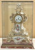 384 - Old Paris Clock in bronze and marble, beveled glass case, 19in. tall, 14in. wide