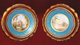 458 - Pair of 19th Century, 10in. Sevres scenic plates in gilt frames, Chenonceau & Tranon