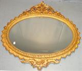 1503 - Gilt, Rococo, Oval Mantle Mirror with fancy carved cherub in crown, 53x51in., ca. 1850