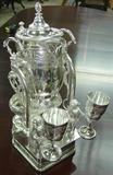 519 - Victorian, Quadruple-plate, Tilt-a-pour with original water goblets, 24in. tall (side)
