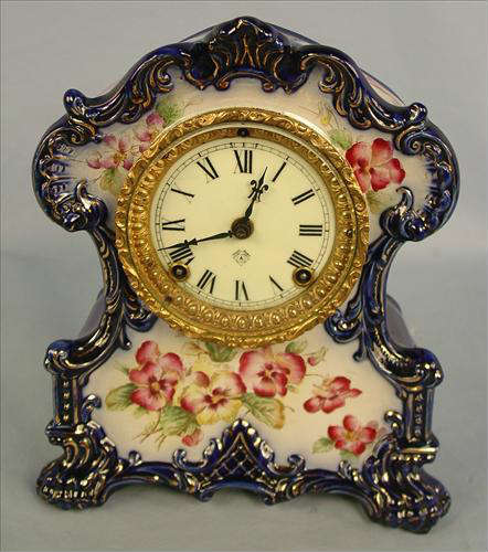 2 - Ansonia Wichita Cobalt Blue China Clock, 12in. T, 10in. W, ca. 1900.