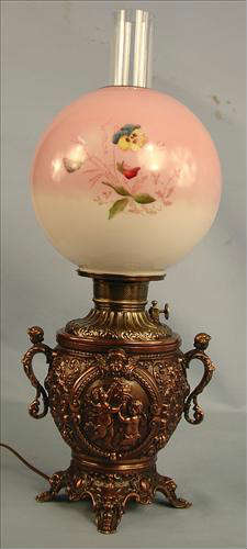 38 - Victorian Brass Lamp with cherubs on side, 24in. T, 9in. W