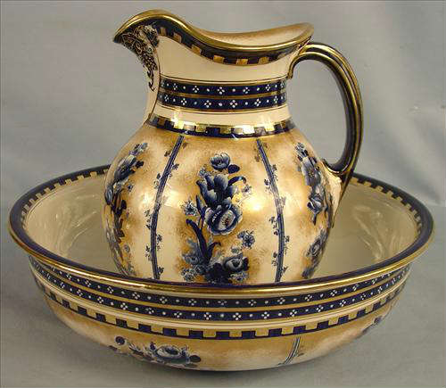 70 - Flow Blue Pitcher and Bowl Set, blue flowers, gold trim, pitcher, 12in. T, bowl, 16in. Dia., ca. 1885