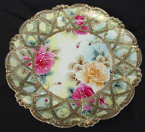 69 - Nippon Plate with roses, 11in. Dia.