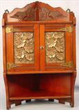 159 - Victorian Walnut Hanging Corner Cabinet with hammered brass panel in door with dental molding on bottom, 24in. T, 14in. W
