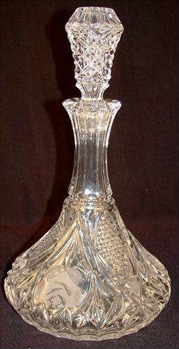 168 - Cut Glass Wine Decanter with cut roses and stopper, 12in. T, 8in. Dia.