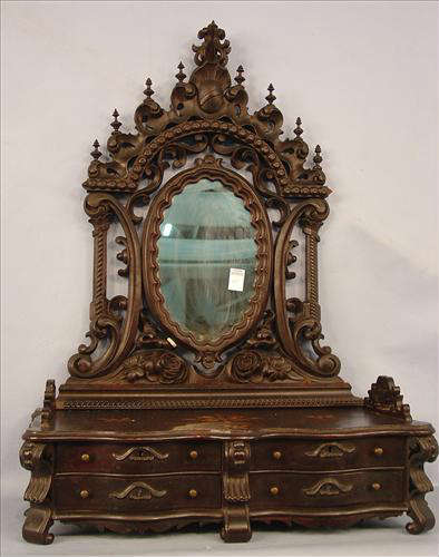 261 - Rosewood Rococo shaving Mirror, inlay in top, carved mirror, 4 drawers, dark finish, ca. 1855.
