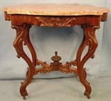 269 - Turtle Top Table with salmon-colored marble, 31in. T, 34in. W, 19in. D.