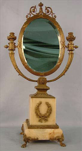 274 - Bronze and onyx Shaving  Mirror, candle holders on top of mirror front with claw feet, 30in. T, 16in. W, 7in. D.