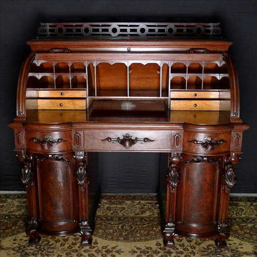 287 - Walnut Rococo Roll top Desk with round front drawers, gallery top, 53in. H, 48in. W, 40in. D. att. to Meeks.