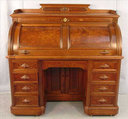 291 - Large Walnut Victorian Roll Top Desk with burl trim and birdseye maple interior, 56in. W, 31in. D, ca. 1870, great refinished condition.