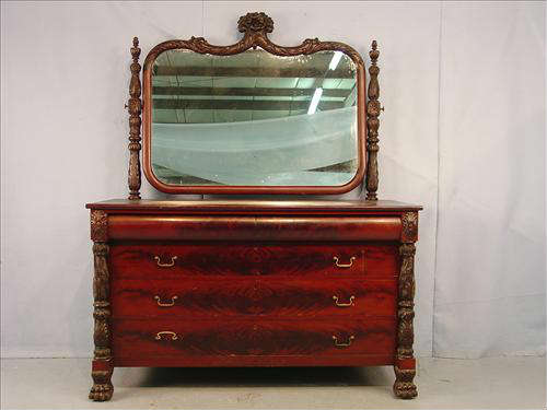301 - Large Dresser with 4 pc. Set, has a beautifully carved mirror crown with bouquet of flowers, 76in. T, 62in. W, 29in. D.