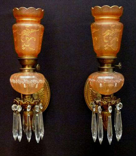 307 - Pair of Cranberry Wall Sconces with phoenix bird shades, 14in. T. still oil, ca. 1880.