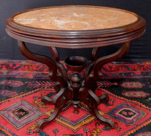 326 - Round Rosewood Marble Top Parlor Table with salmon colored marble, has cup finial, ca. 1875.