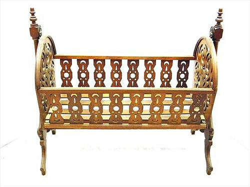 332 - Pierced Carved Walnut Victorian Baby Cradle, 39in. H, 41in. W, 19in. D, ca. 1870.