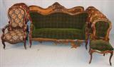 341 - Eight Piece Victorian Rosewood Parlor Set, original finish with carved crest, 2 sofas, gentleman's chair, lady's chair and 4 sides.