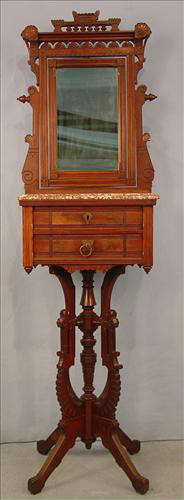 342 - Walnut Eastlake Shaving Stand, very ornately carved, 2 drawers, brown marble top, 71in. T, 20in. W, 14in. D., ca. 1880.
