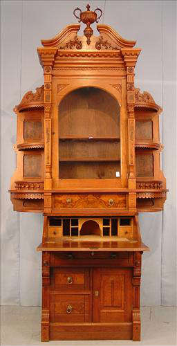 344 - Victorian Eastlake Walnut Drop Front Secretary Bookcase, broken pediment top with carved urn, ca. 1880, 8ft. 8in. T, 51in. W, 21in. D.