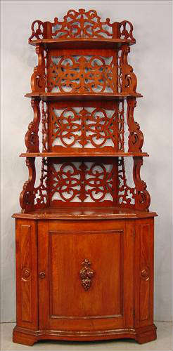 350 - Victorian Walnut Corner Étagère, enclosed base with 4 shelves of diminishing size, pierce carved back, original finish, ca. 1870, 75in. T, 31in. W, 14in. D.