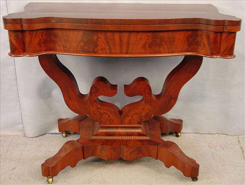372 - Empire Flame Mahogany Game Table, double carved pedestal on 4 footed base, ca. 1875, 29in. T, 36in. W.