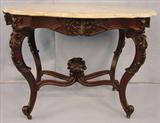 388 - Walnut Rococo Turtle Top Parlor Table with white marble, has bouquet finial, marble has damage, 29in. T, 41in. W, 30in. D.
