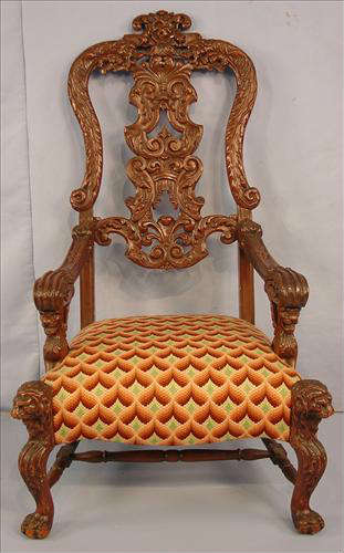 390 - Heavily Carved Solid Mahogany Throne Chair with pierced carved back, lions head carved on arms and legs, 53in. T, 30in. W, 23in. D, att. to Horner.