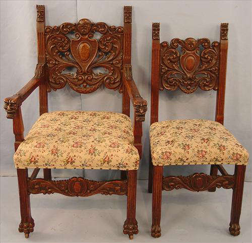 446a - Pair of Heavily Carved Oak Dinning Chairs, 1 arm, 1 side with floral upholstery, 42in. T, 24in. W, 23in. D.