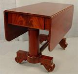 447 - Mahogany Empire Drop Leaf Breakfast Table, unusual style, has 2 columns and drawer, ca. 1880, 29in. T, 42in. W, 21in. D.