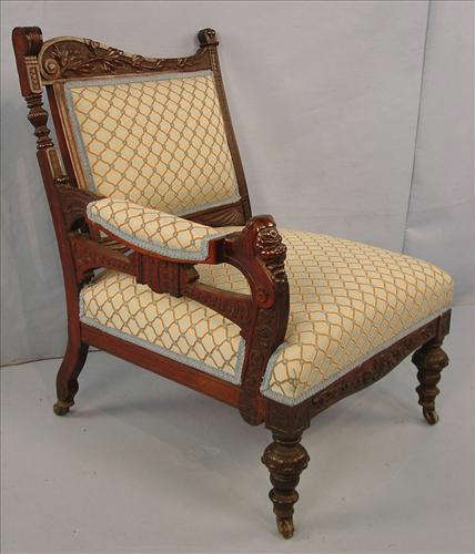 449 - Rosewood Victorian Parlor Chair designed with carved head, ca. 1880, 32in. T, 23in. W, 23in. D.