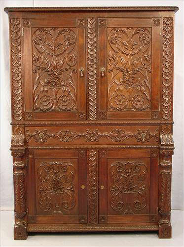 452 - Heavily Carved Mahogany Linen Press with flower bouquet on doors, acanthus carved inlay, 61in. T, 44in. W, 22in. D, ca. 1880.