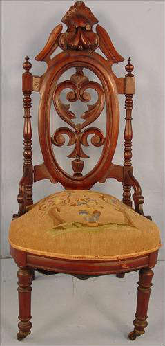 463 - Walnut Victorian Pierced Carved Back Music Chair with original needlepoint seat, ca. 1870, 42in. T, 20in. W, 19in. D.