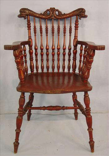 522 - Mahogany Arm Chair with dolphins carved on crown.