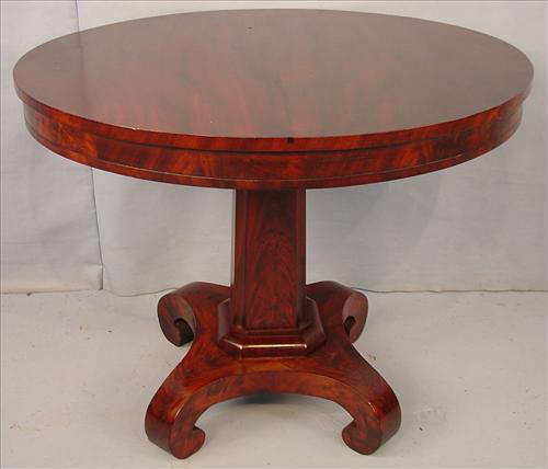 523 - Mahogany Empire Round Center Table, 29in. T, 35in. D. with scroll feet, ca. 1850.