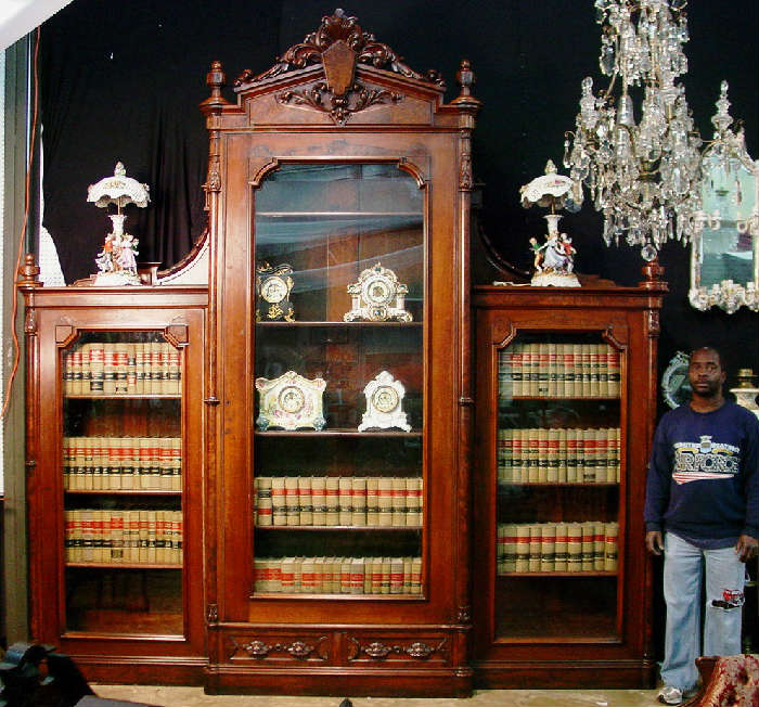 334 - Monumental Walnut Victorian 3 Section Bookcase, 11 ft. T, 10ft. 9in. W, 20in. D, burl trim, heavily carved crown, great condition, ca. 1860.