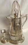 194 - Quadruple-plate, Pair point Tilt-a-pour with cup, signed & dated 1890