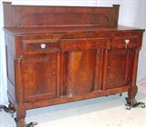 1000 - Flamed Mahogany, Empire Sideboard with chimney backsplash & claw feet, 54in. tall, 67in. long, 23in. deep