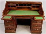 110 - Large Walnut Victorian S-roll top desk, paneled ends and wood carved pulls, everything works, 47in. T, 60in. W, 36in. D, ca. 1860.