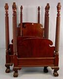 114 - Mahogany pair of twin beds with twisted post and large ball and claw feet, empire style headboards, flamed finials on top of post, post measures 70in. T, bed -75in L, 38in W, ca. 1880.