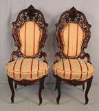 208 - Pair of rosewood laminated rococo side parlor chairs by Meeks, Hawkins pattern, 43in. T, 19in. W, 19in. D. with striped upholstery.