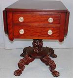 205 - Period mahogany empire drop leaf work table with heavily carved acanthus base and legs, 28in. T, 24in. L, 19in. W, glass pulls, ca. 1840.