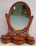 307 - Mahogany rococo dressing mirror, table top model with 3 jewelry drawers, 34in. T, 31in. W, 11in. D, ca. 1855.