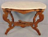 306 - Walnut Victorian turtle top dog table with white marble, 29in. T, 37in. L, 23in. D, ca. 1875.
